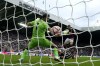 Newcastle United's Sandro Tonali, right, scores their side's first goal of the game during the Premier League soccer match between Newcastle United and Aston Villa at St. James' Park, Newcastle upon Tyne, England, Saturday Aug. 12, 2023. (Owen Humphreys/PA via AP)