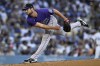 Colorado Rockies starting pitcher Peter Lambert follows through on a throw to a Los Angeles Dodgers batter during the fifth inning of a baseball game in Los Angeles, Saturday, Aug. 12, 2023. (AP Photo/Alex Gallardo)
