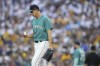 Seattle Mariners starting pitcher George Kirby looks at the ball during the sixth inning of a baseball game against the Baltimore Orioles, Saturday, Aug. 12, 2023, in Seattle. (AP Photo/Lindsey Wasson)