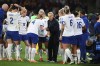 England's head coach Sarina Wiegman, center, talks with players during the Women's World Cup round of 16 soccer match between England and Nigeria in Brisbane, Australia, Monday, Aug. 7, 2023. (AP Photo/Tertius Pickard)