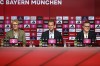 England striker Harry Kane, centre, is presented by Bayern Munich CEO Jan-Christian Dreesen, right, and press officer Dieter Nickles at a press conference at the Allianz Arena following the record transfer from Tottenham Hotspur, in Munich, Sunday Aug. 13, 2023. (Sven Hoppe/dpa via AP)