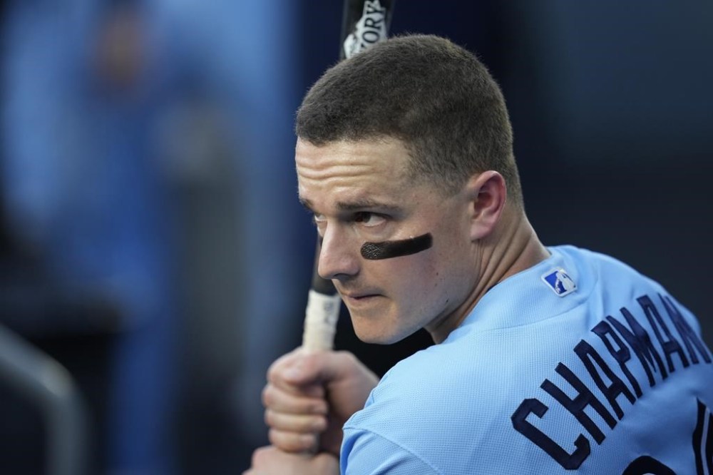 Toronto third baseman Matt Chapman has been scratched from the Blue Jays' series finale against the Chicago Cubs with right middle-finger inflammation. Chapman warms up in the dugout before a baseball game against the L.A. Dodgers, in Los Angeles, Tuesday, July 25, 2023. THE CANADIAN PRESS/AP-Marcio Jose Sanchez