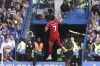 Liverpool's Luis Diaz celebrates after scoring his side's opening goal during the English Premier League soccer match between Chelsea and Liverpool at Stamford Bridge Stadium in London, Sunday, Aug. 13, 2023. (AP Photo/Ian Walton)