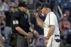 Pittsburgh Pirates manager Derek Shelton right, argues with home plate umpire Nic Lentz, left, after being ejected during the sixth inning as his team takes on the Cincinnati Reds in the second baseball game of a doubleheader in Pittsburgh, Sunday, Aug. 13, 2023. (AP Photo/Matt Freed)