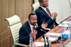 FILE - Ethiopia's Prime Minister Abiy Ahmed, left, accompanied by House speaker Tagesse Chafo, right, addresses the parliament in the capital Addis Ababa, Ethiopia on Nov. 15, 2022. Authorities in Ethiopia are carrying out mass arrests of hundreds, even thousands, of people in the capital after deadly unrest in the country’s Amhara region, lawyers and witnesses said. Ethiopia’s parliament is to vote Monday Aug. 14, 2023 on giving formal approval to extraordinary measures which allow authorities to arrest suspects without a warrant, conduct searches and impose curfews. (AP Photo/File)