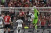 Real Madrid's goalkeeper Andriy Lunin, right, clears the ball during the Spanish La Liga soccer match between Athletic Club and Real Madrid at the San Mames stadium in Bilbao, Spain, Saturday, Aug. 12, 2023. (AP Photo/Alvaro Barrientos)