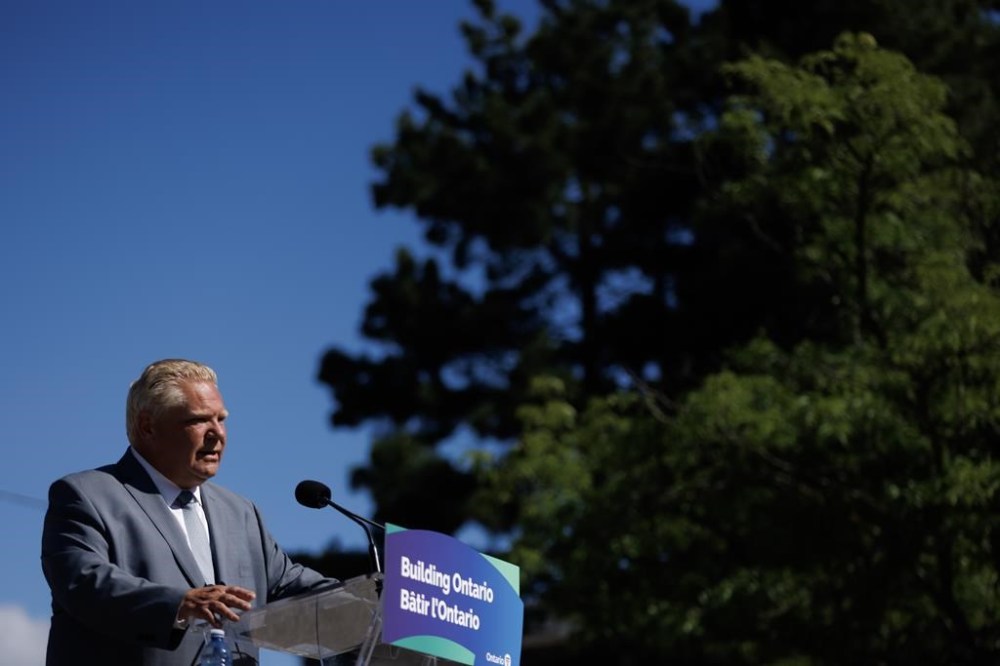 Ontario Premier Doug Ford speaks during a press conference in Mississauga, Ont., Friday, Aug. 11, 2023. The province says it is creating a working group to implement recommendations made in a damning auditor general's report on the government's decision to remove land from the protected Greenbelt. THE CANADIAN PRESS/Cole Burston
