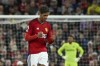 Manchester United's Raphael Varane celebrates after scoring his side's opening goal during the English Premier League soccer match between Manchester United and Wolverhampton at the Old Trafford stadium in Manchester, England, Monday, Aug. 14, 2023. (AP Photo/Rui Vieira)