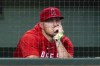 Los Angeles Angels' Mike Trout watches from the dugout during the ninth inning of the team's baseball game against the Houston Astros, Friday, Aug. 11, 2023, in Houston. (AP Photo/Eric Christian Smith)