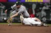 St. Louis Cardinals' Tyler O'Neill is safe at second for a stolen base as Oakland Athletics shortstop Nick Allen handles the throw during the fifth inning of a baseball game Monday, Aug. 14, 2023, in St. Louis. (AP Photo/Jeff Roberson)