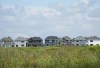 A row of new homes is pictured in Ottawa on Monday, Aug. 14, 2023. THE CANADIAN PRESS/Sean Kilpatrick