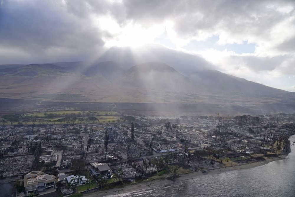 FILE - Wildfire wreckage is seen Thursday, Aug. 10, 2023, in Lahaina, Hawaii. The search of the wildfire wreckage on the Hawaiian island of Maui on Thursday revealed a wasteland of burned out homes and obliterated communities. (AP Photo/Rick Bowmer, File)