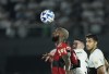 Gerson of Brazil's Flamengo eyes the ball during a Copa Libertadores round of 16 second leg soccer match against Paraguay's Olimpia at Defensores del Chaco stadium in Asuncion, Paraguay, Thursday, Aug.10, 2023. (AP Photo/Jorge Saenz)