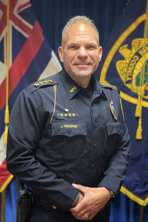 FILE - This undated photo released by the County of Maui shows Maui Police Chief John Pelletier. Pelletier has been pleading for patience while bodies of victims of Hawaii’s deadly wildfires are found and identified. He has also recalled the excruciating experience of notifying relatives after another sudden and massive tragedy nearly six years ago, in Las Vegas. (Shane Tegarden/County of Maui via AP, File)
