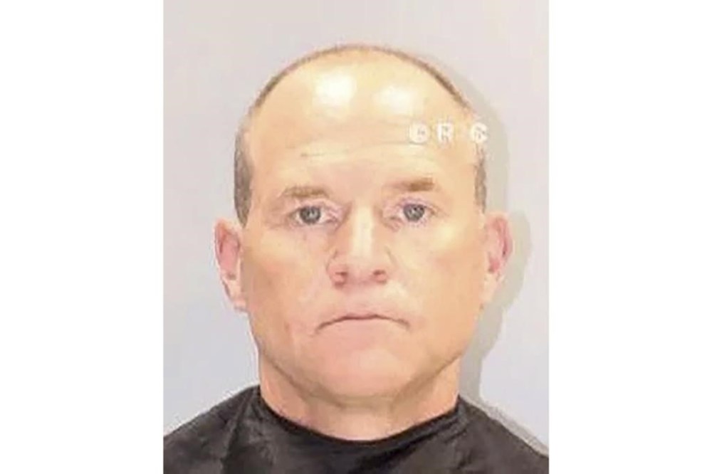 This undated mugshot provided by the Richland County Detention Center shows Cory Fleming. The longtime friend of Alex Murdaugh was sentenced Tuesday, Aug. 15, 2023 to nearly four years in prison for scheming to steal millions of dollars in insurance settlements from the sons of his dead housekeeper. (Richland County Detention Center via AP)