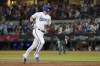 Texas Rangers' Corey Seager rounds the bases after hitting a two-run home run in the third inning of a baseball game against the Los Angeles Angels, Tuesday, Aug. 15, 2023, in Arlington, Texas. (AP Photo/Tony Gutierrez)
