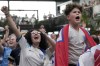 England fans react as England score their third goal, as they watch a screening of the Women's World Cup 2023 semifinal soccer match between England and Australia at BOXPARK Wembley in London, Wednesday, Aug. 16, 2023. (AP Photo/Frank Augstein)