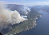 The Lower East Adams Lake wildfire in B.C.'s Shuswap region is shown in a handout photo. Wildfire crews in British Columbia are bracing for an incoming weather system expected to bring strong winds and dry lightning by Thursday, but conditions are already flaring in at least two areas of the province. THE CANADIAN PRESS/HO-BC Wildfire Service **MANDATORY CREDIT**