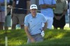 Keegan Bradley watch his shot out of a bunker on the eighth green during the pro-am round of the BMW Championship golf tournament, Wednesday, Aug. 16, 2023, in Olympia Fields, Ill. (AP Photo/Charles Rex Arbogast)