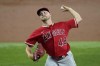 Los Angeles Angels starting pitcher Reid Detmers throws to a Texas Rangers batter during the third inning of a baseball game Wednesday, Aug. 16, 2023, in Arlington, Texas. (AP Photo/Tony Gutierrez)