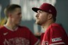 Los Angeles Angels' Reid Detmers stands in the dugout before the eighth inning of a baseball game against the Texas Rangers, Wednesday, Aug. 16, 2023, in Arlington, Texas. (AP Photo/Tony Gutierrez)