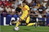 FILE - Barcelona's Raphinha controls the ball during their Spanish La Liga soccer match againsy Getafe at the Coliseum Alfonso Perez stadium in Getafe, Spain, Sunday, Aug. 13, 2023. Barcelona will be missing coach Xavi Hernandez and winger Raphinha for its first competitive game at its temporary home stadium. Barcelona hosts Cadiz at the Lluis Companys Olympic Stadium on Sunday, Aug. 20. (AP Photo/Alvaro Medranda, file)