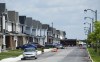 A row of newly-constructed homes is pictured in in Ottawa on Monday, Aug. 14, 2023. A report by a University of Ottawa-based think tank says that all levels of government need to collaborate to get more housing built in the province, but that work also needs to include the post-secondary education sector. THE CANADIAN PRESS/Sean Kilpatrick