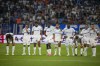 Marseille players stand on the pitch during the penalty shootout during the Champions League soccer match between Marseille and Panathinaikos at the Velodrome stadium in Marseille, southern France, Tuesday, Aug. 15, 2023. (AP Photo/Daniel Cole)