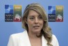 Foreign Affairs Minister Melanie Joly speaks with reporters at the NATO Summit in Vilnius, Lithuania, Tuesday, July 11, 2023. Joly says Canada has been considering a 