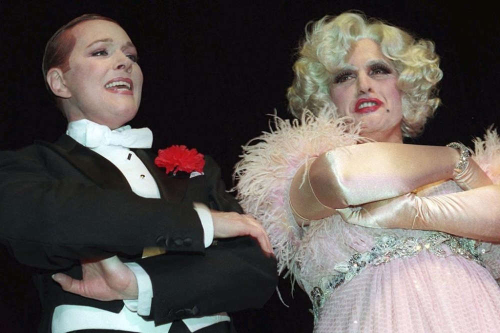 FILE — New York Mayor Rudolph Giuliani, right, dressed in drag as a role in
