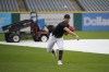 Cleveland Guardians pitcher Tanner Bibee throws next to the tarp after a baseball game between the Detroit Tigers and the Guardians was cancelled due to rain, Thursday, Aug. 17, 2023, in Cleveland. (AP Photo/Sue Ogrocki)
