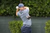 Rory McIlroy watches his tee shot on the second hole during the first round of the BMW Championship golf tournament, Thursday, Aug. 17, 2023, in Olympia Fields, Ill. (AP Photo/Charles Rex Arbogast)