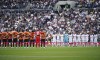 Tottenham Hotspur and Shakhtar Donetsk players line up before the pre-season friendly soccer match between Tottenham and Shakhtar Donetsk, at the Tottenham Hotspur Stadium, London Sunday August 6, 2023. (Yui Mok/PA via AP)