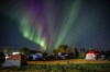Evacuees from Yellowknife are greeted with the Aurora Borealis as they arrive to a free campsite provided by the community in High Level, Alta., Friday, Aug. 18, 2023. THE CANADIAN PRESS/Bill Braden