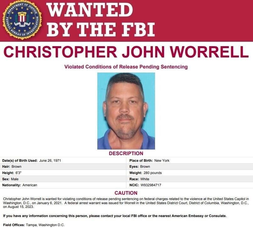This image released by the FBI shows the wanted poster for Christopher Worrell. Authorities are searching for Worrell, a member of the Proud Boys extremist group, who disappeared days before his sentencing in a U.S. Capitol riot case, where prosecutors are seeking more than a decade in prison, according to a warrant made public Friday, Aug. 18, 2023. (FBI via AP)