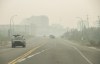 The streets of Yellowknife are empty after nearly all residents from the capital of the Northwest Territories were forced to flee under the threat of an encroaching wildfire. Heavy smoke from nearby wildfires fills the sky in Yellowknife, Tuesday, Aug. 15, 2023. THE CANADIAN PRESS/Angela Gzowski