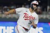 Minnesota Twins' Matt Wallner rounds third base en route to scoring against the Pittsburgh Pirates on a Donovan Solano single during the sixth inning of a baseball game Friday, Aug. 18, 2023, in Minneapolis. (AP Photo/Bruce Kluckhohn)