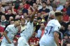 Bournemouth's Antoine Semenyo, center, celebrates after scoring the opening goal during the Premier League soccer match between Liverpool and AFC Bournemouth at Anfield, in Liverpool, England, Saturday, Aug. 19, 2023. (AP Photo/Rui Vieira)