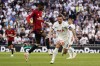 Tottenham's Pierre-Emile Hojbjerg, centre right, and Manchester United's Marcus Rashford challenge for the ball during the Premier League soccer match between Tottenham Hotspur and Manchester United at the Tottenham Hotspur Stadium in London, England, Saturday, Aug. 19, 2023. (AP Photo/Alberto Pezzali)