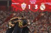Real Madrid players celibrate after Vinicius Junior scored his side's third goal during a Spanish La Liga soccer match between Almeria and Real Madrid at the Power Horse Stadium in Almeria, Spain, Saturday, Aug. 19, 2023. (AP Photo/Fermin Rodriguez)