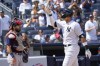 New York Yankees' Aaron Judge reacts as he walks across home plate after hitting a solo home run in the sixth inning of a baseball game against the Boston Red Sox, Saturday, Aug. 19, 2023, in New York. (AP Photo/Mary Altaffer)