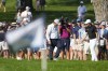 Matt Fitzpatrick, right, talks to a tournament official near his ball in the rough on the 18th hole during the third round of the BMW Championship golf tournament, Saturday, Aug. 19, 2023, in Olympia Fields, Ill. (AP Photo/Charles Rex Arbogast)