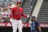 Los Angeles Angels' Shohei Ohtani reacts after striking out during the first inning in the first baseball game of a doubleheader against the Tampa Bay Rays, Saturday, Aug. 19, 2023, in Anaheim, Calif. (AP Photo/Marcio Jose Sanchez)