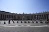People sit in the shade as they wait for Pope Francis to recite the Angelus noon prayer from the window of his studio overlooking St.Peter's Square, at the Vatican, Sunday, Aug. 20, 2023. (AP Photo/Andrew Medichini)