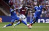 Aston Villa's Moussa Diaby is tackled by Everton's Ashley Young, left, during the English Premier League soccer match between Aston Villa and Everton at Villa Park, in Birmingham, England, Sunday, Aug. 20, 2023. (David Davies/PA via AP)
