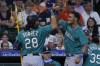 Seattle Mariners' Eugenio Suarez celebrates with Julio Rodriguez after hitting a two run home run during the second inning of a baseball game against the Houston Astros, Sunday, Aug. 20, 2023, in Houston. (AP Photo/Kevin M. Cox)