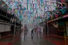 A man crosses a street after the landfall of Tropical Storm Hilary in Rosarito, Mexico, Sunday, Aug. 20, 2023. Hilary hit the coast in a sparsely populated area about 150 miles (250 kilometers) south of Ensenada, Mexico. (AP Photo/Alex Cossio)