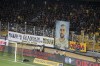 A banner shows the picture of Michalis Katsouris, an AEK fan who was killed last week in an attack led by Croatian supporters, in the OPAP Arena, prior to the Champions League third qualifying round match between AEK Athens and Dinamo Zagreb, in Nea Philadelphia suburb, Athens, Greece, Saturday, Aug. 19, 2023. UEFA president Aleksander Ceferin met with Greece's prime minister Kyriakos Mitsotakis on Wednesday and promised to do more to deal with organized violence in soccer in the wake of a deadly attack led by Croatian fans in Athens. (Dimosthenis Kamsis/InTime Sports via AP)
