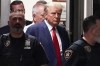 FILE - Former President Donald Trump is escorted to a courtroom, April 4, 2023, in New York. (AP Photo/Mary Altaffer, File)