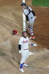 Philadelphia Phillies' Bryce Harper reacts after hitting an inside-the-park home run against San Francisco Giants pitcher Sean Hjelle during the fifth inning of a baseball game, Monday, Aug. 21, 2023, in Philadelphia. (AP Photo/Matt Slocum)